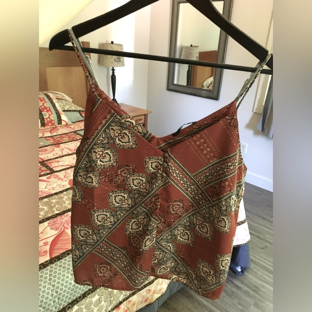 Only burnt orange patterned tank; with navy, beige and cream accent colours
